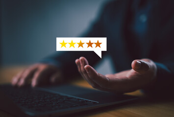 Businessman or customer showing popup five-star icon for feedback review satisfaction service,...