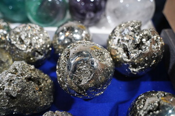 Balls with inclusions of pyrite stones.