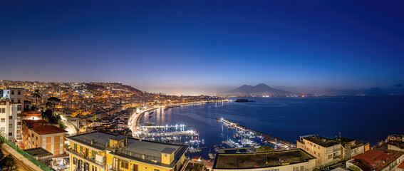 Panorama of Naples with Mount Vesuvius in the back at night