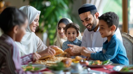 Happy Middle Eastern family shares pita bread at dining table on Ramadan