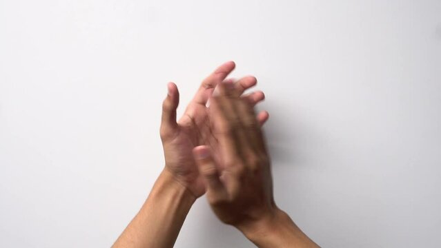 Men's hands clapping on a white background