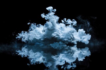 A captivating puff of blue smoke expanding symmetrically against a pitch-black backdrop, reflected on a smooth surface to enhance its visual impact.