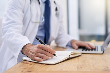 Doctor, writing and hands of notes with computer and medical research for muscular dystrophy in office. Person, tech and report information in notebook with medical study of healthcare worker