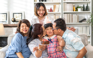 Portrait of happy love asian big family father and mother with asian baby and little girl happy birthday, party, celebration, cake, surprise, grandmother smiling together.Family party