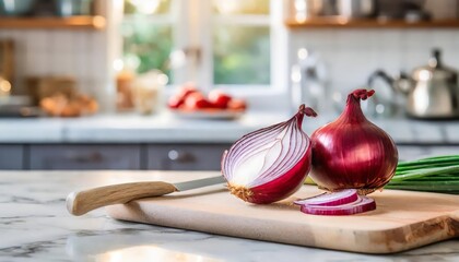 A selection of fresh vegetable: red onions, sitting on a chopping board against blurred kitchen background; copy space - Powered by Adobe