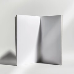 An open book with blank pages against a white backdrop, symbolizing potential and creativity.
