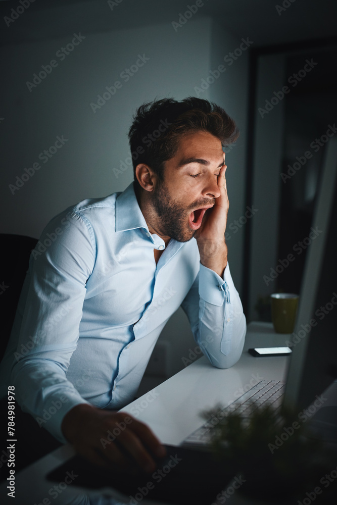 Poster Man, tired and yawning in office with computer for coding, programming and software development at night. Business fatigue, late or night for information technology and engineer with burnout in dark