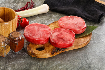 Delicous raw tuna medallion for cooking