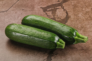 Raw green ripe zucchini vegetable