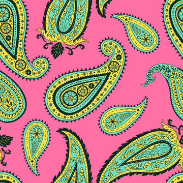 Colorful seamless pattern with Paisley motifs on pink background. Traditional indian repeat design.