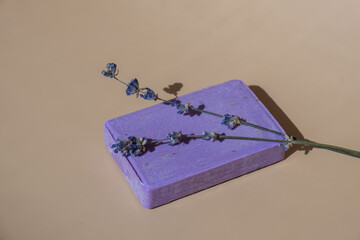 Handcrafted purple lavender soap with lavender flowers. Natural hydrating moisturiser softness cosmetic. Organic calming beauty skincare product. Herbal self care wellness alternative soap