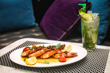 White Plate With Shrimp and Drink