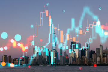 New York cityscape with digital hologram of financial stock charts, against an evening sky. Technology and business concept. Double exposure