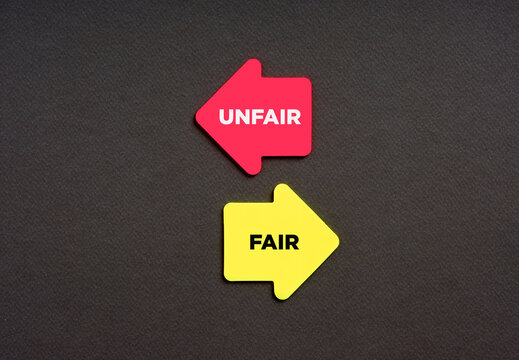 The dilemma between choosing the unfair or fair alternative options. Business concept. The words unfair and fair on arrows pointing opposite directions.
