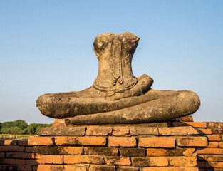 ruins stone statue of buddha outdoors
