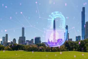 New York cityscape with a holographic fingerprint security concept over a park, with skyscrapers in the background. Double exposure