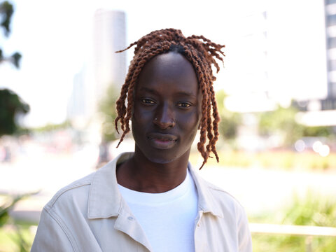 Portrait of Sudanese man wearing a jacket outside