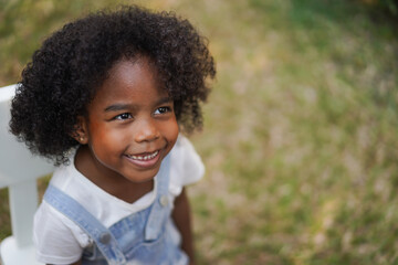 Portrait happy african american cute girl smiling face looking at camera at home, kid, child, young...