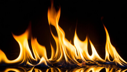 Fototapeta premium Closeup of fire isolated on black background