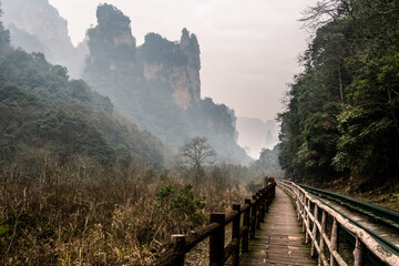 Zhangjiajie, China: Hiking path in the dramatic landscape of the Wulingyuan Scenic Area in Hunan...