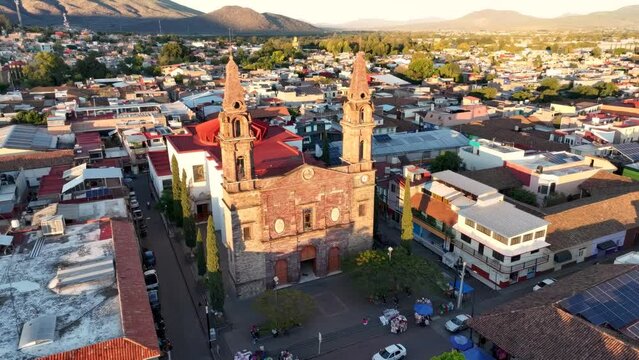 Drone shot of the Catholic Parish of Our Lady of the Assumption in Tangancicuaro, Michoacan, Mexico