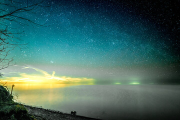 The View of Starry Night Over The Woods and Lighthouse in Lake Ontario