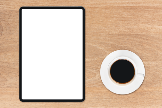 the tablet is on the wood table