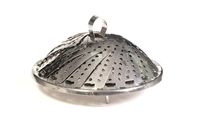 Old kitchen tool for boiling vegetables, place it in a pan with little water