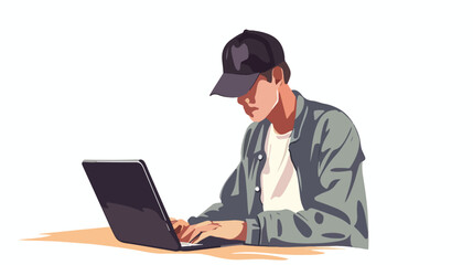 Young man in baseball cap working on a black laptop 