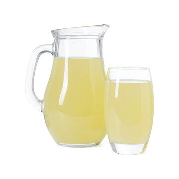 Refreshing lemon juice in jug and glass isolated on white
