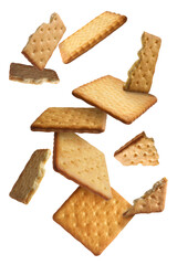 Tasty dry crackers falling on white background