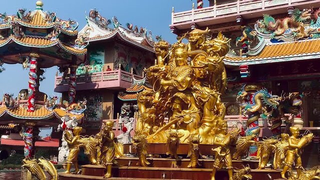 Naja statue golden is a beautiful Thai and Chinese architecture of Nachas sa thai chute shrine, naja shrine, najasaataichue, nezha shrine chinese temple. good luck Chinese New Year celebrations.