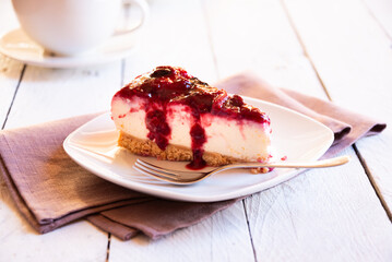 Delicious piece of cheesecake with berries - 785082502