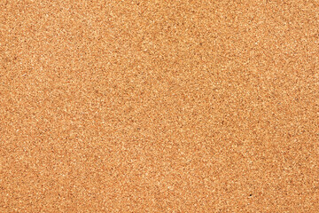 Fototapeta na wymiar Cork board background from above, abstract texture
