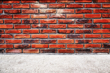 Brick wall and concrete flooring background