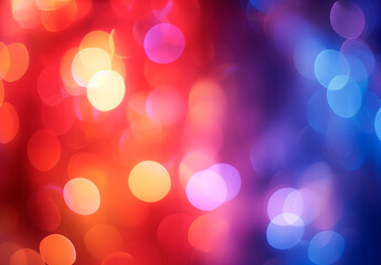 Fototapeta premium Bokeh lights in red and blue hues. Wallpaper for celebrations and cards with copy space. 