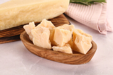 Chopped Italian hard parmesan cheese