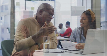 Obraz premium Image of data processing over diverse business people at office