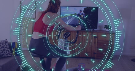 Image of data processing over caucasian woman exercising, using stationary bike