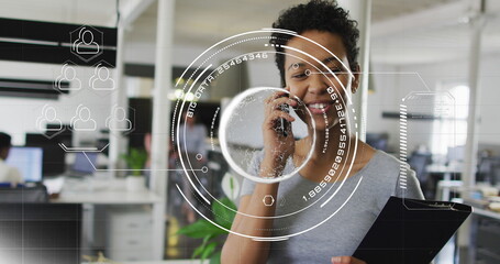 Image of data processing and scope scanning over african american businesswoman using smartphone