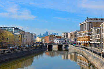 Moscow, Russia. Vodootvodny Canal embankments and Moscow City skyscrapers.
