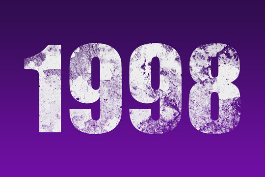 flat white grunge number of 1998 on purple background.