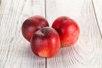 Ripe sweet juicy nectarines heap