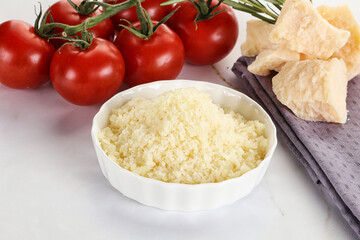 Shredded Italian hard parmesan cheese