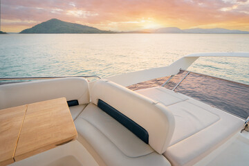 Luxury traveling. Interior of modern motor yacht on sunset