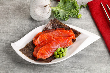 Sliced salmon sashimi in the plate