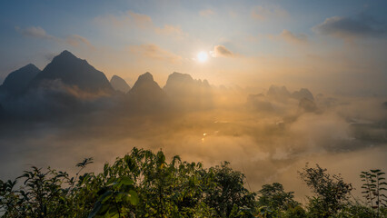 Fototapeta na wymiar Scenery of Ngoc Con mountain, Cao Bang province, Vietnam filled with mist in the early morning