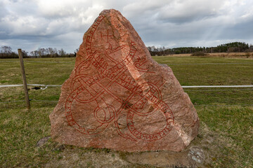 Stockholm, Sweden An ancient rune stone from the Viking era in thr Taby district.