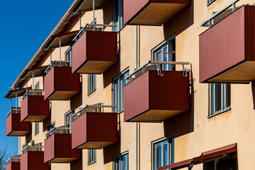 Stockholm, Sweden Apartment balconies on the facade of a residential house in the Minneberg...