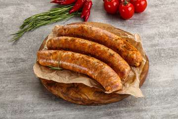 Raw sausages with spices and herbs